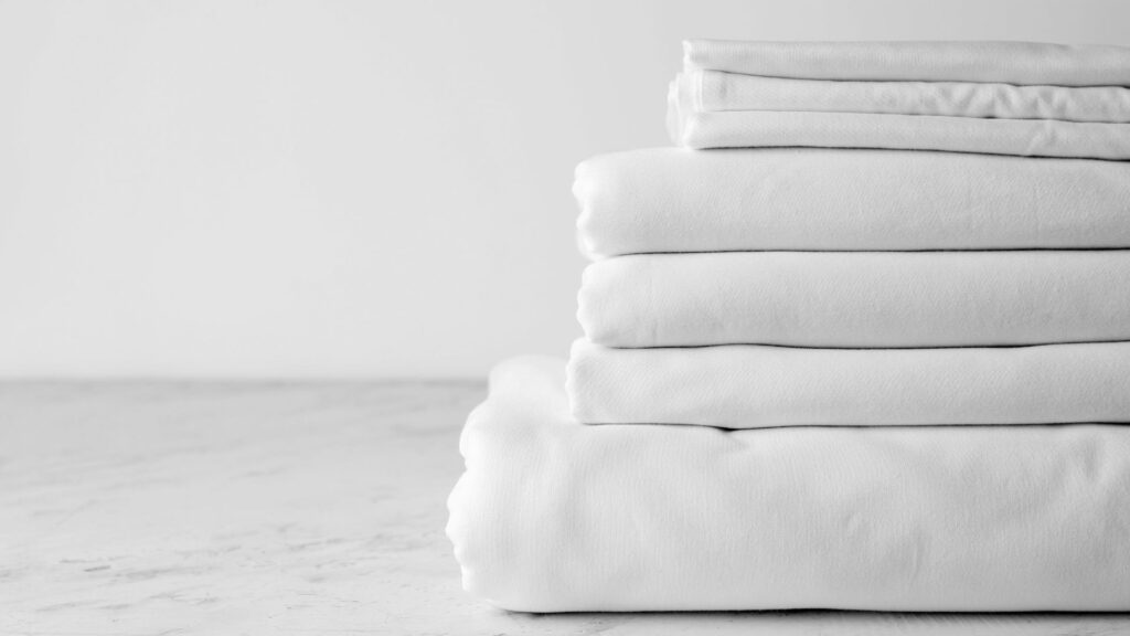 limpiar sábanas blancas manchas amarillas lavanderia industrial eslamatex barcelona malgrat de mar